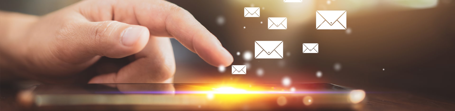 hand on tablet mail graphic.
