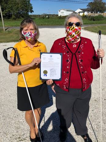 NFBMD Eastern Shore Chapter Members Amy Crouse and Mary Elligson receive White Cane Awareness Day Proclamation for Worcester County